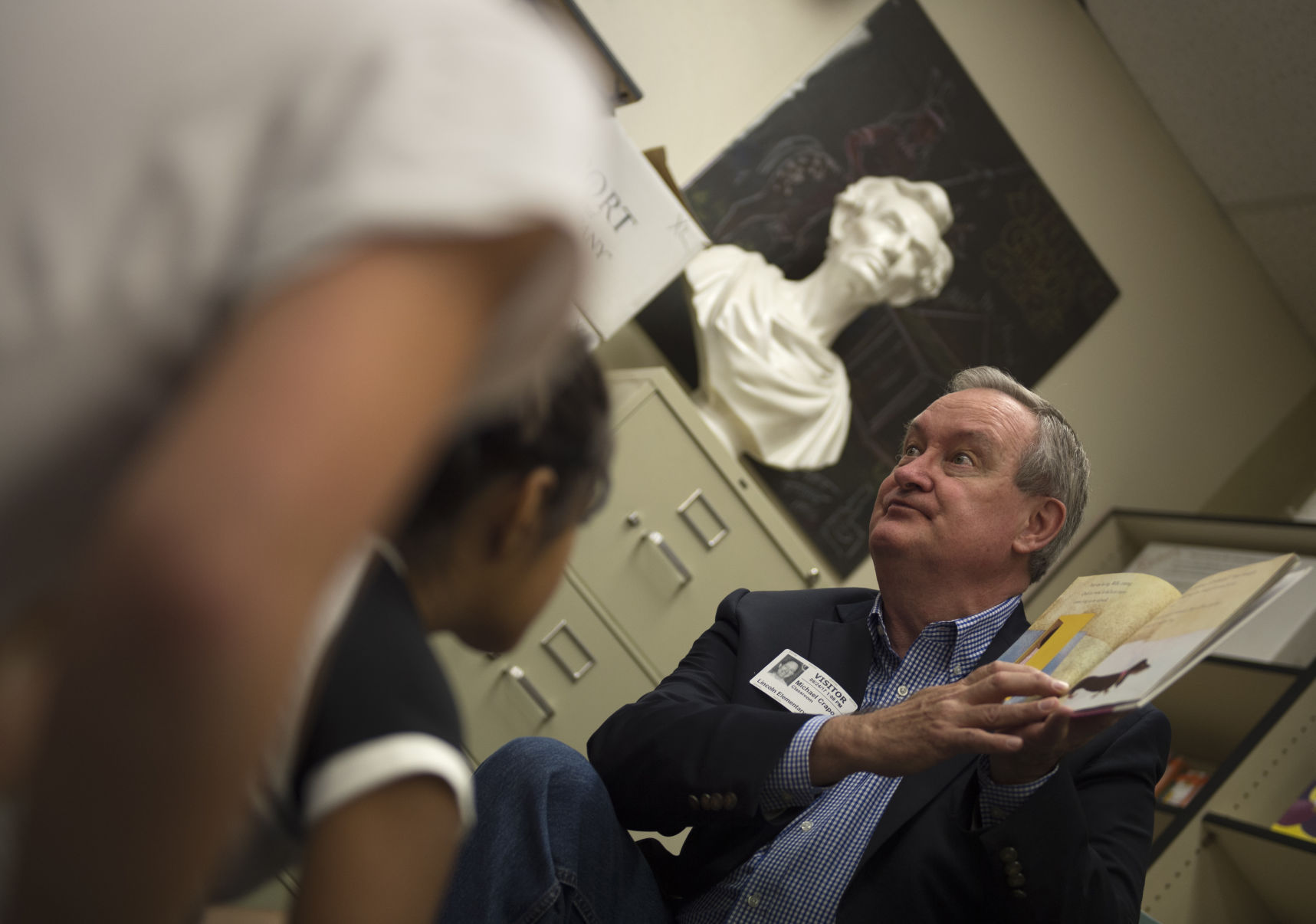 Senator Crapo gives books to school library